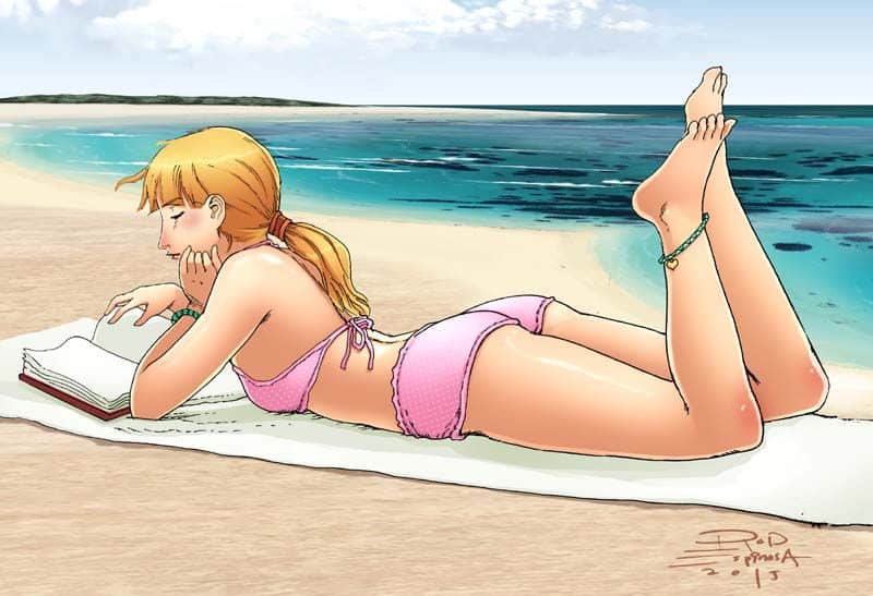 girl reading comics beach